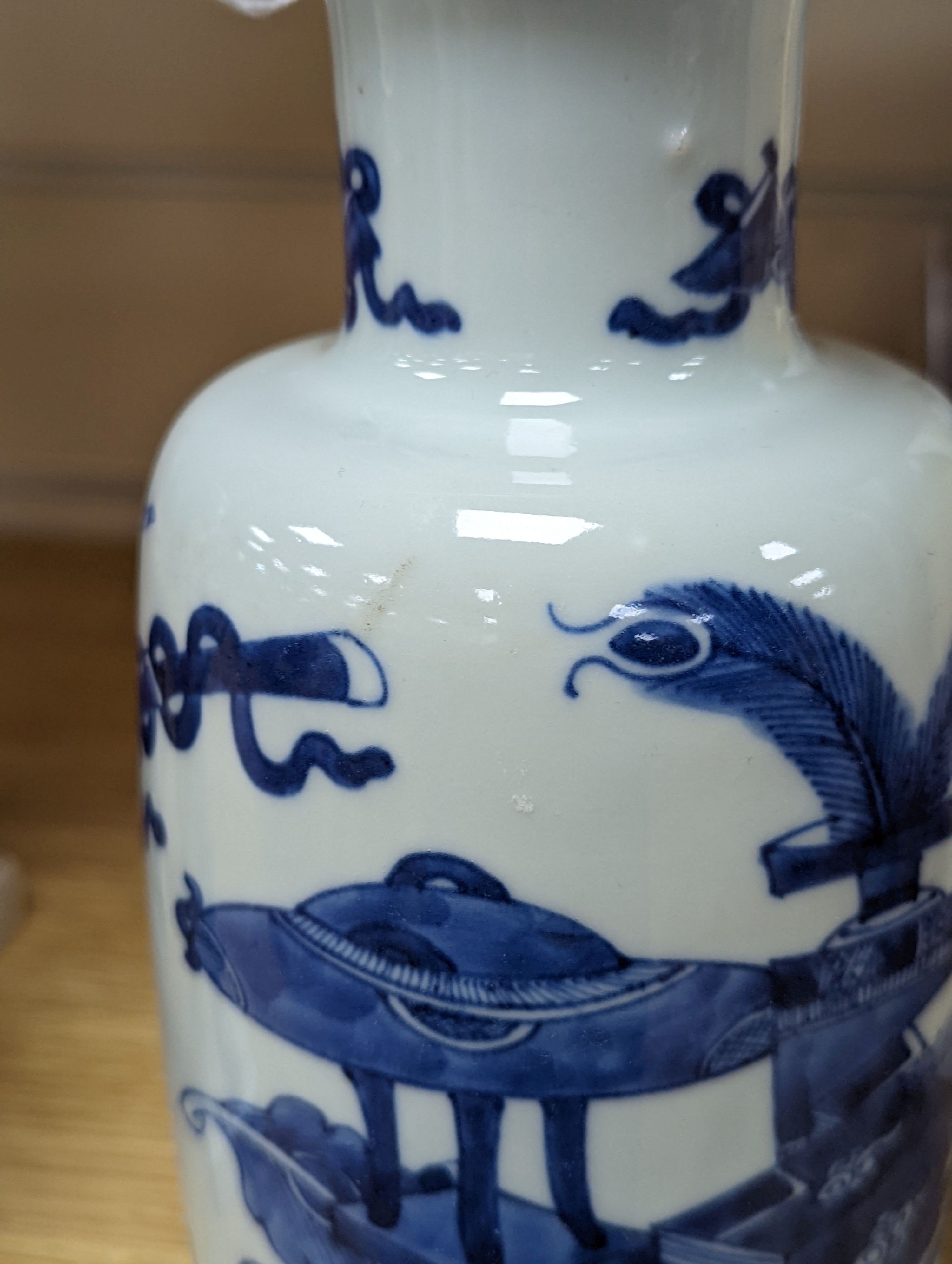 A Chinese blue and white ‘Antiques’ vase, 19.5 cms high.